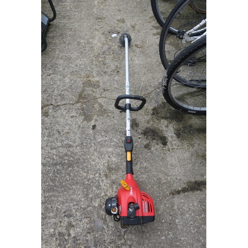 26 - HOMELITE PETROL STRIMMER