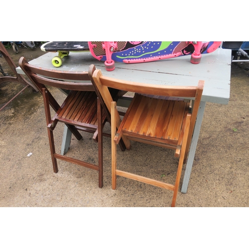 67 - WOODEN GARDEN TABLE AND 4 CHAIRS