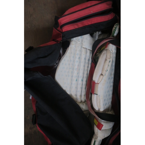 267 - SLAZENGER BAG WITH CRICKET EQUIPMENT INCLUDING SHOES SIZE 10