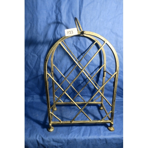 733 - PAIR OF CAST IRON WINE RACKS