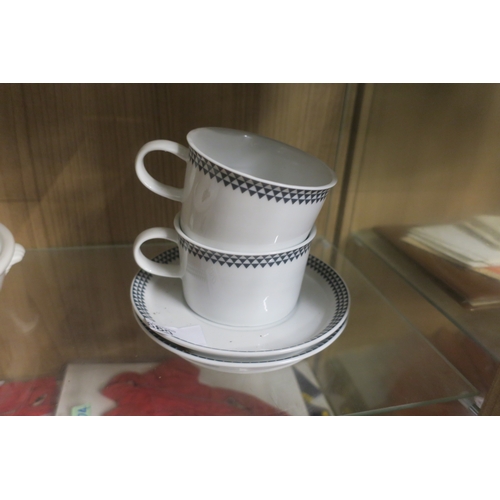 680 - PAIR OF BEN DE LISI CUPS AND SAUCERS