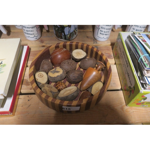 815 - TREEN BOWL OF CARVED OBJECTS