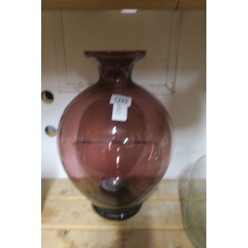 1243 - LARGE CRANBERRY COLOURED GLASS VASE