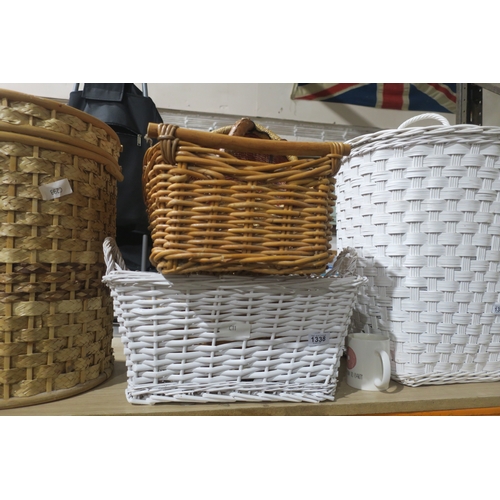 1338 - SMALL STACK OF WICKER BASKETS INCLUDING A WICKER CLAM SHELL