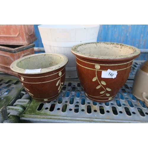 142 - 2 BROWN GLAZED PLANTERS AND WHITE ROUND PLANTER