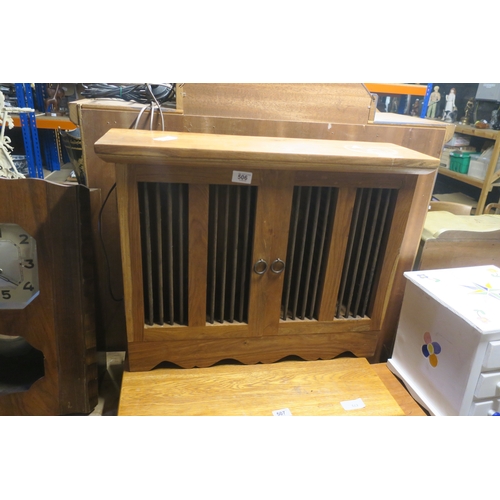 506 - HARDWOOD CD CABINET WITH RUSTIC METAL BARS