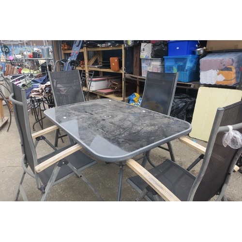 93 - GLASS GARDEN TABLE AND 4 FOLDING CHAIRS