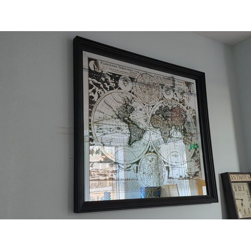 20 - Timothy Oulton. A  designer hall mirror, decorated with an antique style map of the world.145cm wide... 