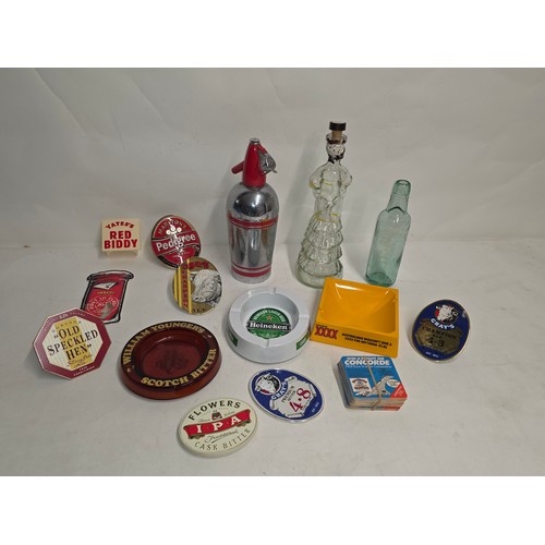 140 - Breweriana. A collectors or resellers lot to include vintage pub ashtrays, beer pump signs, Soda Fou... 