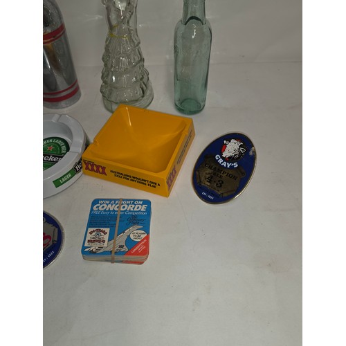 140 - Breweriana. A collectors or resellers lot to include vintage pub ashtrays, beer pump signs, Soda Fou... 