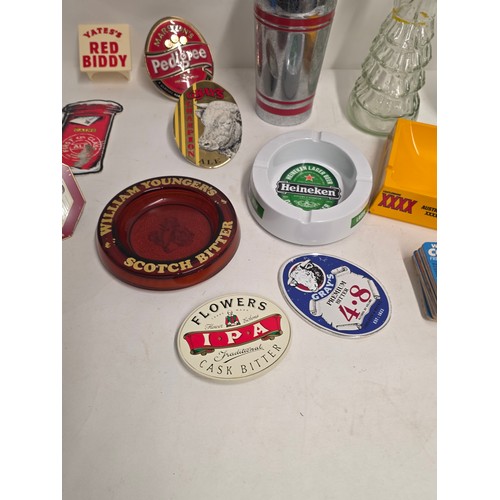 140 - Breweriana. A collectors or resellers lot to include vintage pub ashtrays, beer pump signs, Soda Fou... 