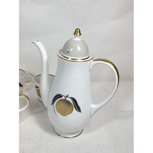 12 - Susie Cooper pre Wedgwood Pomme D'or pattern part coffee set comprising of a a Coffee Pot, six sauce... 