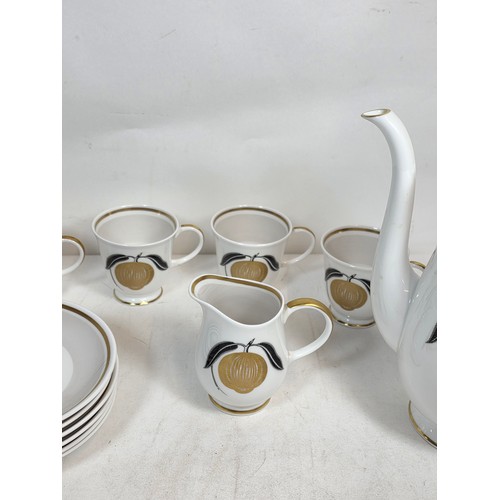 12 - Susie Cooper pre Wedgwood Pomme D'or pattern part coffee set comprising of a a Coffee Pot, six sauce... 