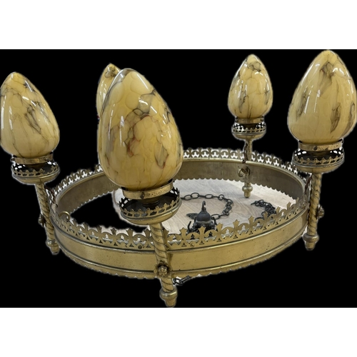 16 - A 19th century bronze Pugin style 5 light chandelier, in the gothic style. The round body with molde... 