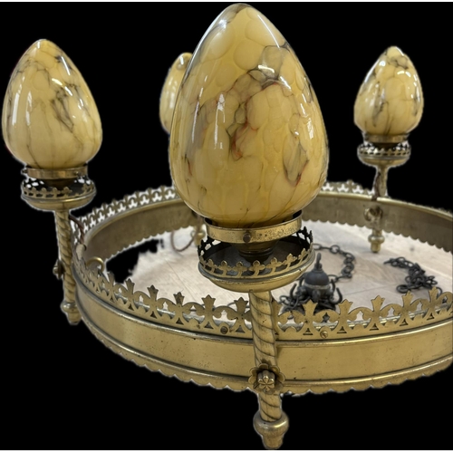 16 - A 19th century bronze Pugin style 5 light chandelier, in the gothic style. The round body with molde... 