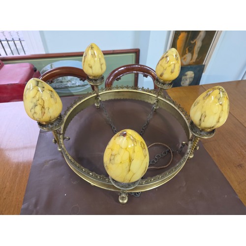 16 - A 19th century bronze Pugin style 5 light chandelier, in the gothic style. The round body with molde... 