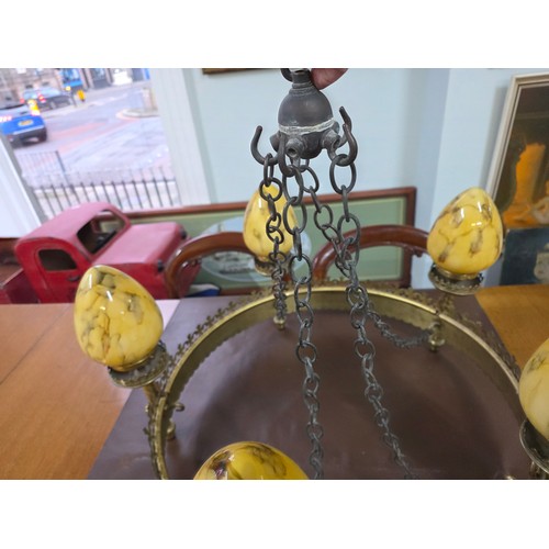 16 - A 19th century bronze Pugin style 5 light chandelier, in the gothic style. The round body with molde... 