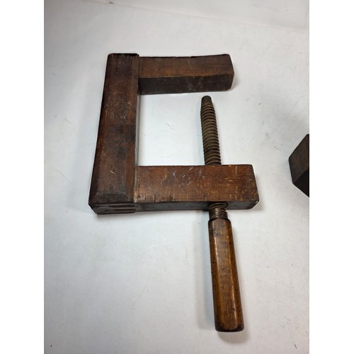 23 - Two vintage wooden joiners clamps, one stamped W.J. Buckley