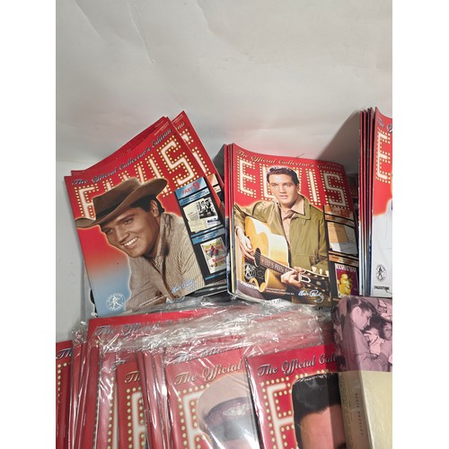 31 - Elvis Presley, aprox 86 of the official collector's edition Elvis magazines some still vacuum sealed... 