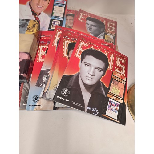 31 - Elvis Presley, aprox 86 of the official collector's edition Elvis magazines some still vacuum sealed... 