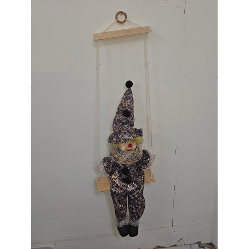 Vintage puppet style young clown with porcelain face and stuffed body on a string. Length of doll is 61cm