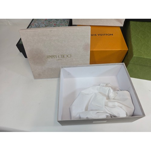 52 - A quantity of 6 branded boxes of various sizes to include Gucci, Louis Vuiton, Jimmy Choo and Yves S... 