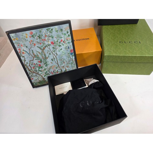 52 - A quantity of 6 branded boxes of various sizes to include Gucci, Louis Vuiton, Jimmy Choo and Yves S... 