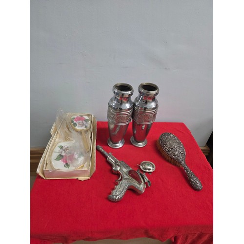 Lot to include Sterling Silver Art Nouveau dressing table mirror, a pair of steel vases, a dressing table set to include mirror and brush, a metal tortoise and toy metal gun