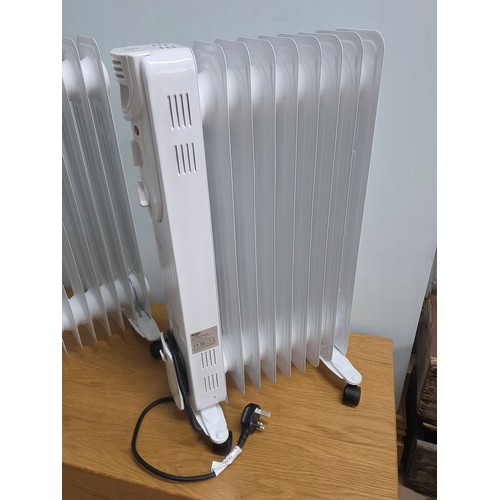 7 - A pair of Bush 2kw Oil Filled radiators model number CYBL209