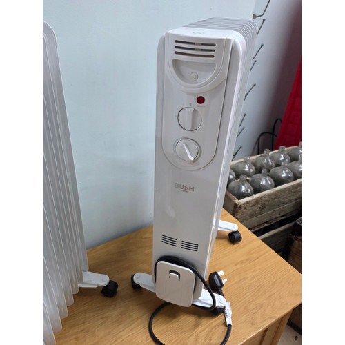 7 - A pair of Bush 2kw Oil Filled radiators model number CYBL209