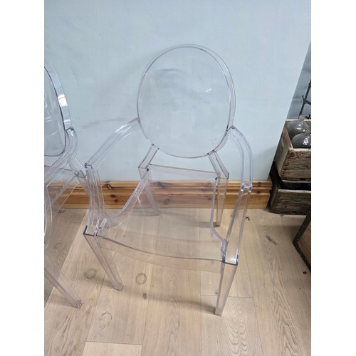 9 - A pair of Louis Ghost Chairs, reinterpreted by Phillipe Starck for Kartell