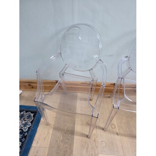 9 - A pair of Louis Ghost Chairs, reinterpreted by Phillipe Starck for Kartell