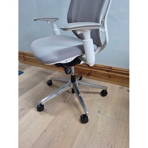 11 - Okamura Sylphy high back office chair in light grey.
