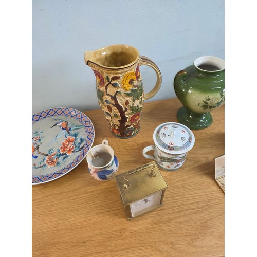 16 - Mixed lot to include ceramics, a brass cased carriage clock and a vintage Revlon compact