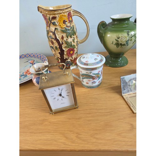 16 - Mixed lot to include ceramics, a brass cased carriage clock and a vintage Revlon compact