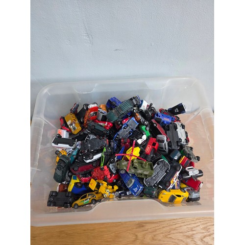 19 - A large collection of playworn die cast vehicles in a plastic crate