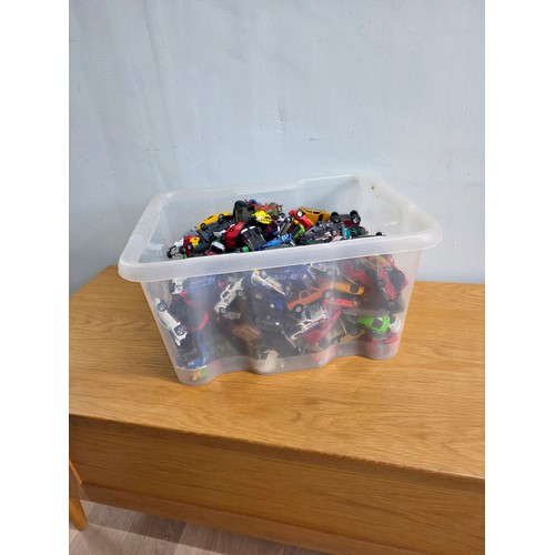 19 - A large collection of playworn die cast vehicles in a plastic crate