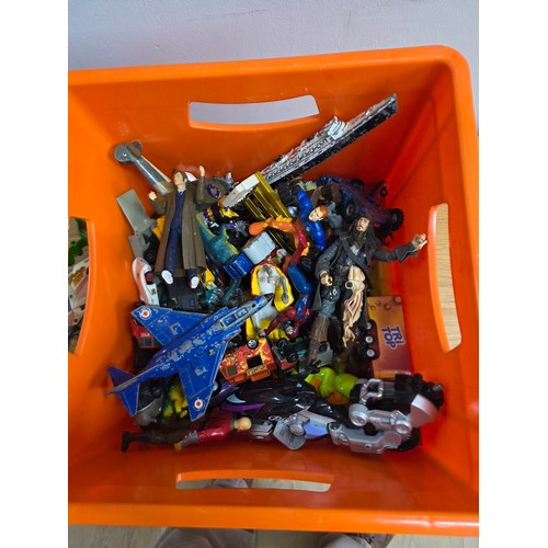 20 - A collection of playworn die cast vehicles and action figures in a plastic crate