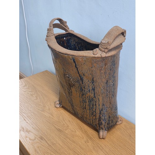 28 - Stoneware stick stand, modelled to look like a water carrier, handmade rustic look with salt glaze f... 