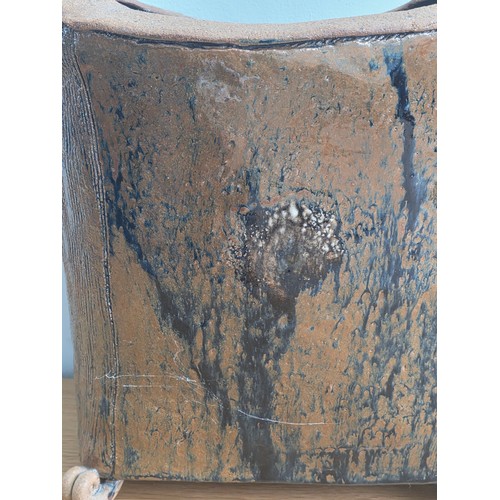 28 - Stoneware stick stand, modelled to look like a water carrier, handmade rustic look with salt glaze f... 