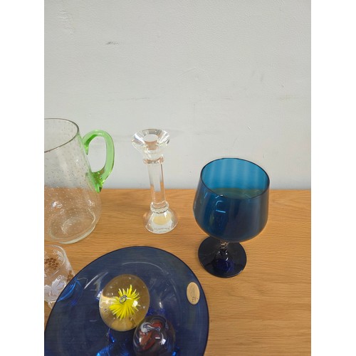 30 - A mixed lot of vintage glass to include Ice bucket, juice jug, candle sticks, paperweights, a bonbon... 