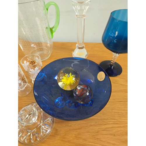 30 - A mixed lot of vintage glass to include Ice bucket, juice jug, candle sticks, paperweights, a bonbon... 