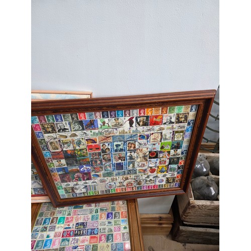 42 - Stamp art, a collection of 100's of stamps mostly British, within 10 picture frames