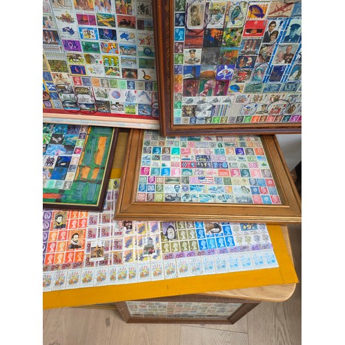 42 - Stamp art, a collection of 100's of stamps mostly British, within 10 picture frames