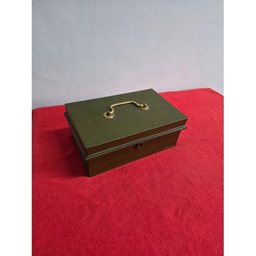 43 - Pre war army green metal cash box Brass handle with commemorative and other coins