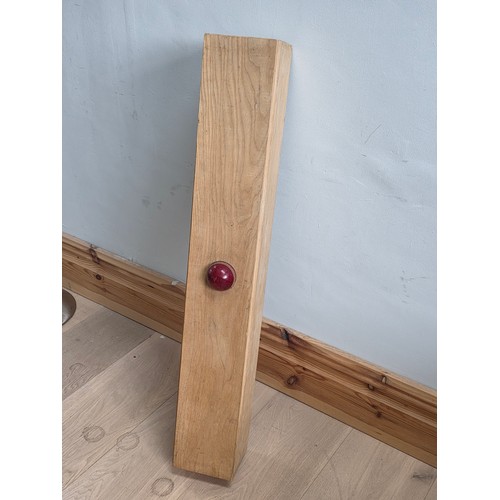 47 - A novelty chalk board in the form of traditional cricket bat with cricket ball surmount. Presented i... 