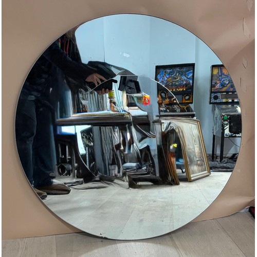 A modern designer style circular glass hall mirror, inset with smaller mirror. 