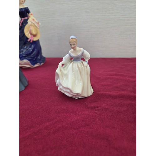 100 - Six Royal Doulton ceramic figurines to include Midnight Stroll HN3954, Coralie HN2307, Christine HN2... 