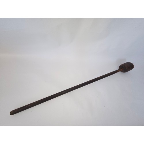 Wooden ramrod for antique cannon.