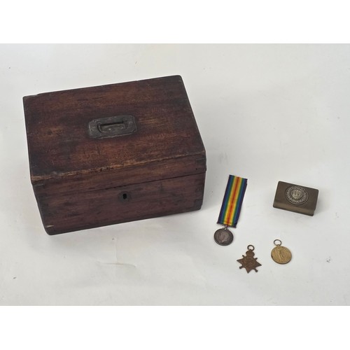 Of WW1 interest, an interesting mixed lot comprising a trench art brass box, the lid made from a German Soldiers belt buckle, and containing a WW1 Trio to L. Parsons (Able Seaman) RN &amp; MFA, together with a wooden box &amp; MN Badges &amp; Discharge Books to L. Parsons